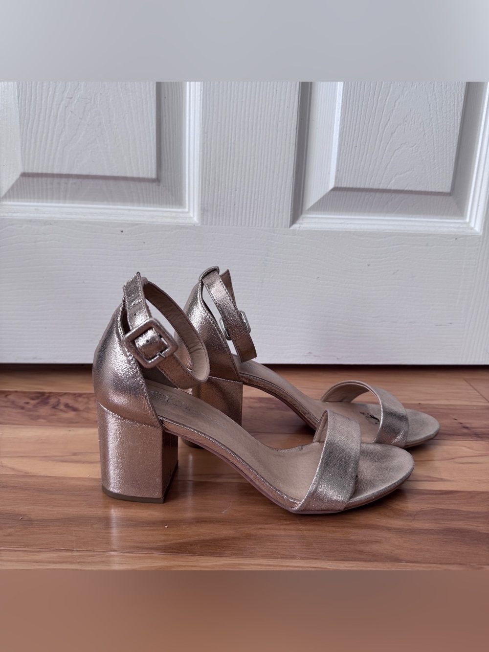 Gold heels by CL Laundry